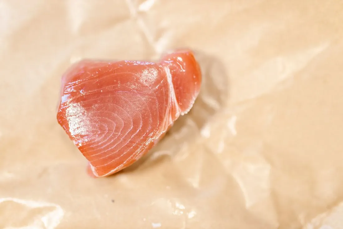A fresh tuna loin, illustrating our seasonal fish