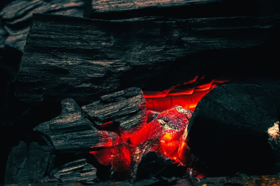 Low embers resting in the dark